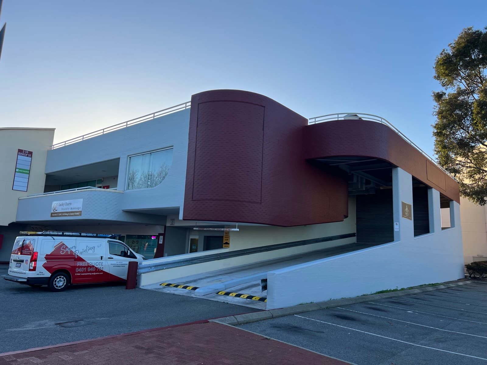 Super Painting WA van at a commercial building it repainted in Perth
